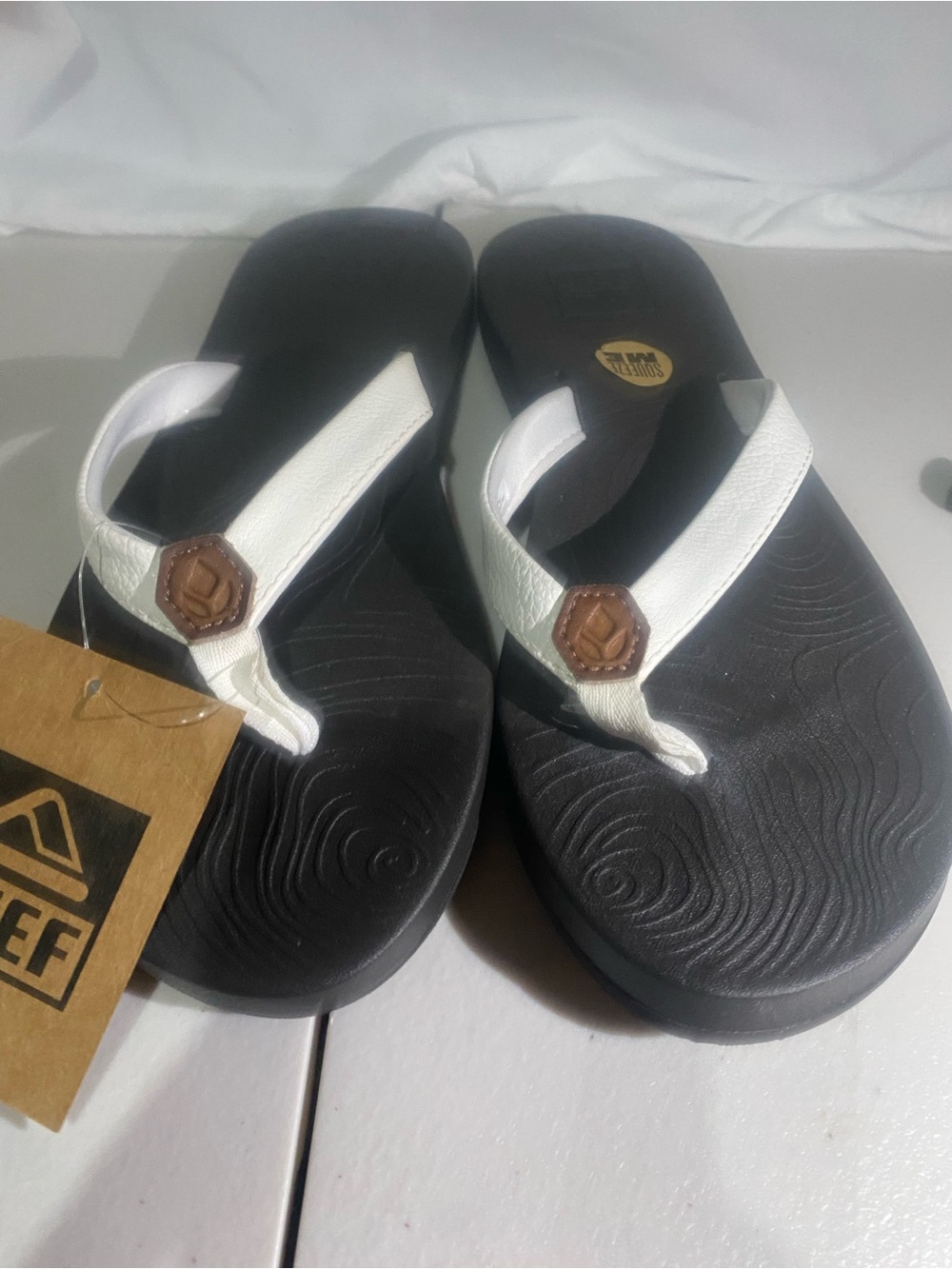 Reef Black Footbed White Strap Flip-Flop Sandals